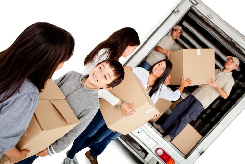 Man with van service loading items for transport