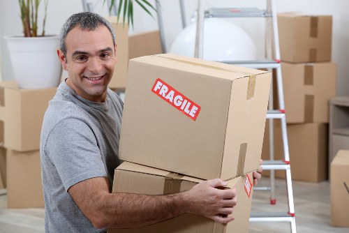 Packing boxes and household items for a local move in Debeauvoirtown