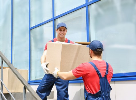 Removal team preparing a home move in Debeauvoirtown