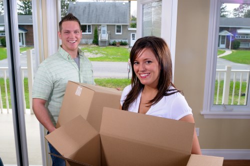 Man with a van loading household items in De Beauvoir Town