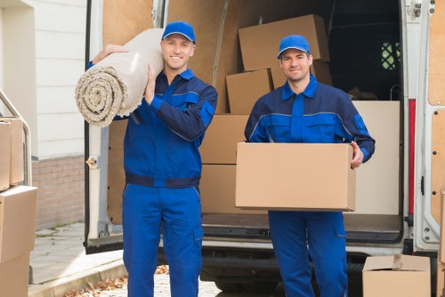 Removal team loading furniture for a Debeauvoirtown home move