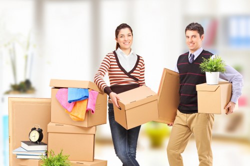 Careful loading of furniture and boxes into a moving van