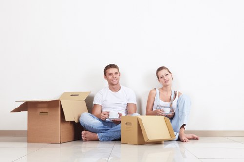 Professional movers loading items for a local relocation