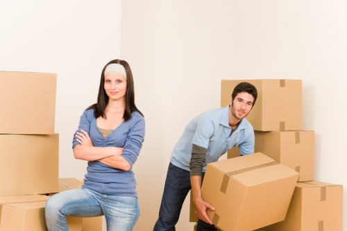 Loading furniture into a removal van on a Debeauvoirtown street