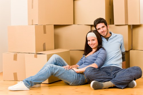 Moving crew handling office items at a Debeauvoirtown commercial property