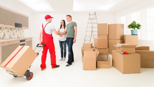 Movers handling a family house relocation in Debeauvoirtown
