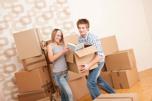 Moving team coordinating access and loading at a Debeauvoirtown business property